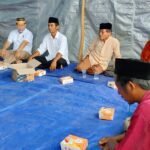 Drs H. Zainal Arifin Paliwang, SH, M.Hum saat menghadiri peringatan HUT ke 7 Desa UPT Tanjung Buka SP9