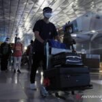 antarafoto-puncak-arus-mudik-natal-bandara-soetta-23122020-bal-1_1