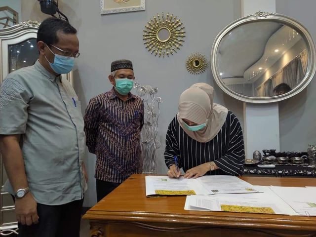 Penandatanganan serah terima aset